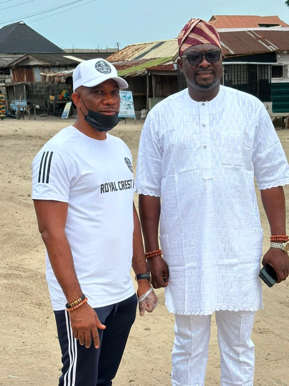 Royal Crest FC players and technical staff clearing drainage pathways and public spaces during the Ajegunle-Apapa community sanitation initiative.